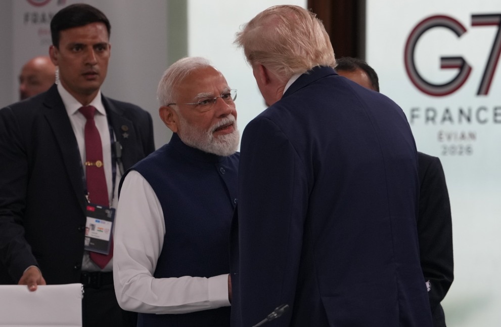 Trump stands up from his chair as PM Modi enters