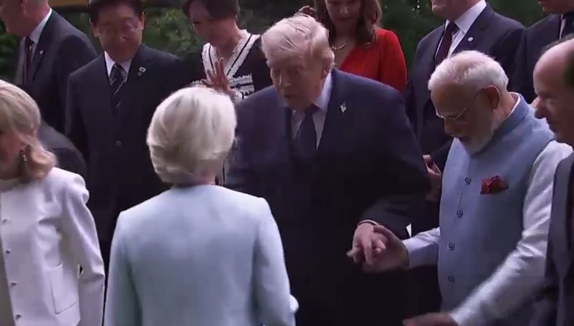 Both global leaders engaged in a long conversation after a handshake