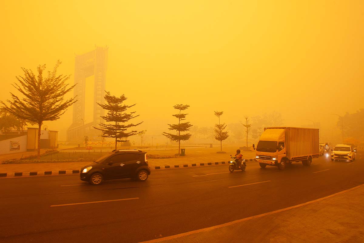 indonesia wildfires yellow sky