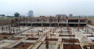 फाइल फोटो: नोएडा एक्‍सटेंशन में निर्माण