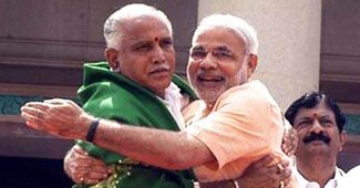 बी एस येदियुरप्पा और नरेंद्र मोदी
