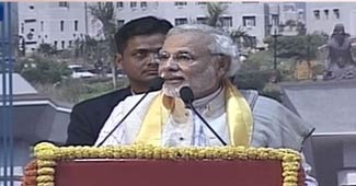 दिल्‍ली में भाषण देते नरेंद्र मोदी