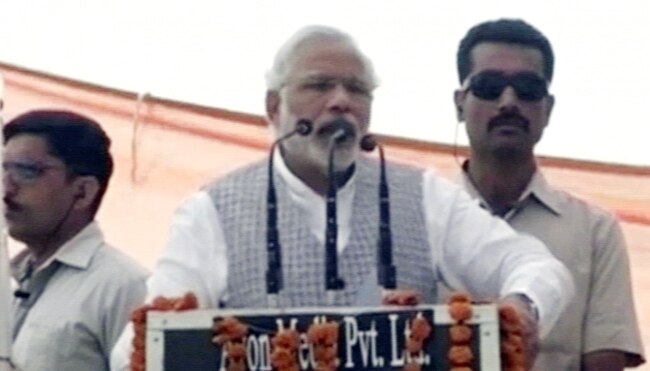 कानपुर में चुनावी रैली को संबोधित करते हुए बीजेपी के पीएम उम्‍मीदवार नरेंद्र मोदी