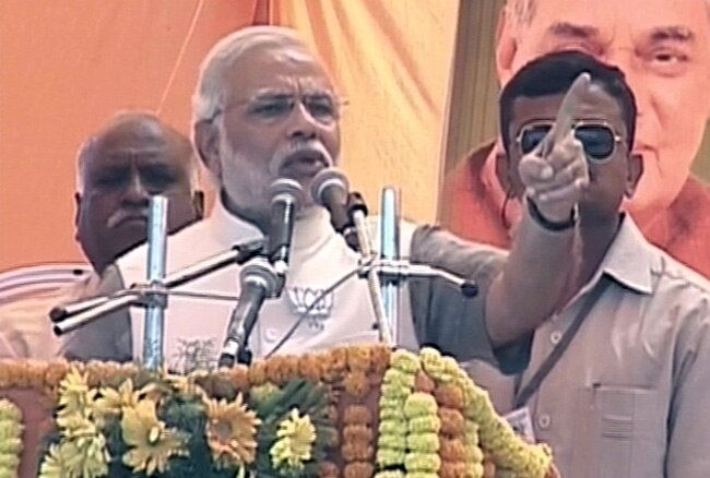 कुरुक्षेत्र में रैली को संबाेधित करते नरेंद्र मोदी