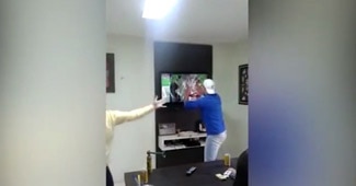 Brazilian Fan smashes off TV