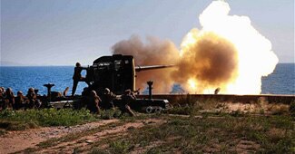 गोलीबारी करते उत्‍तर कोरियाई सैनिक