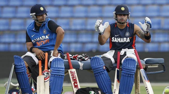 File photo: सुरेश रैना और विराट कोहली