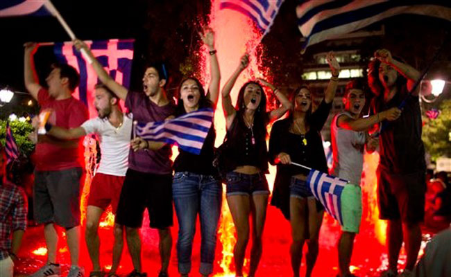 Greek nationals celebrating after referendum