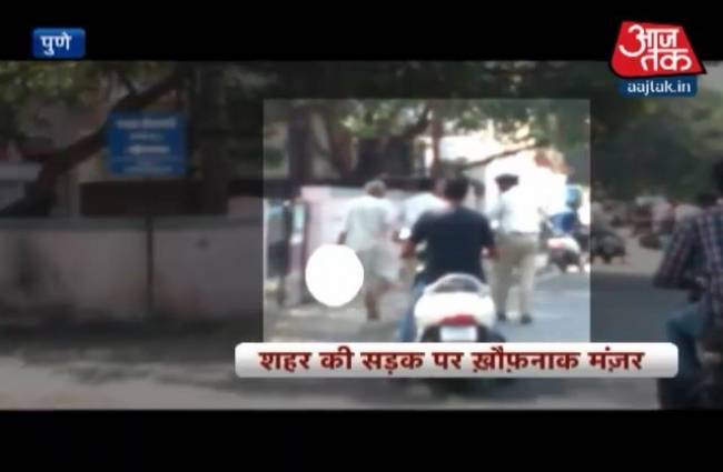 पत्नी का कटा हुआ सिर लेकर सड़क पर निकला शख्स