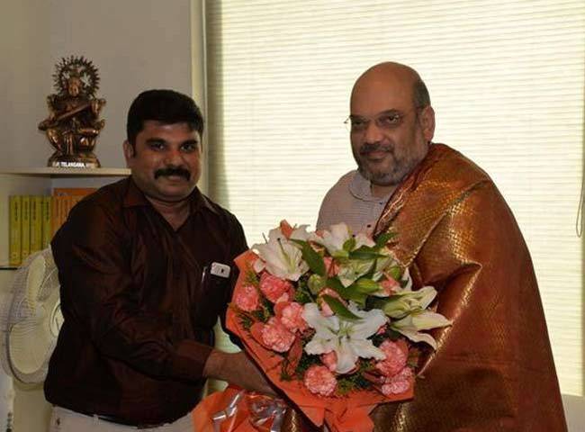 अमित शाह के साथ एपीजे शेख सलीम (फाइल फोटो)