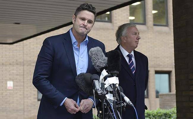 Chris Cairns speaks to members of the media outside Southwark Crown Court in London