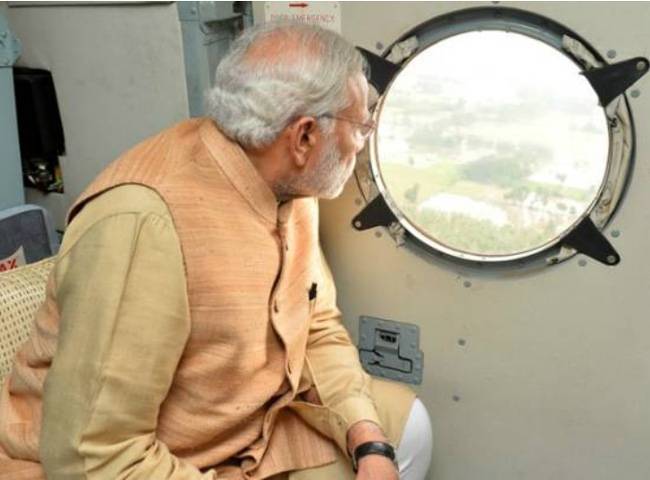 चेन्नई के हवाई सर्वेक्षण के दौरान प्रधानमंत्री की असल तस्वीर