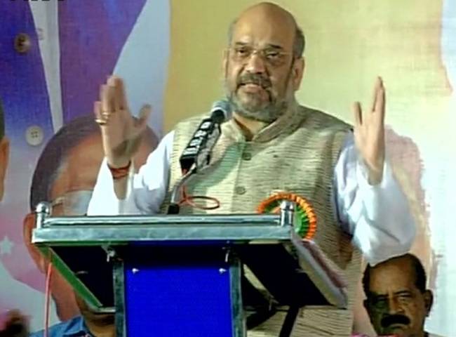 चुनावी रैली को संबोधि‍त करते अमित शाह