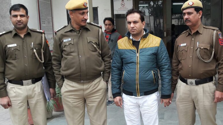 पुलिस गिरफ्त में आरोपी इमरान