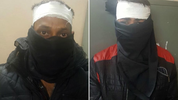 पुलिस गिरफ्त में खड़े दोनों आरोपी