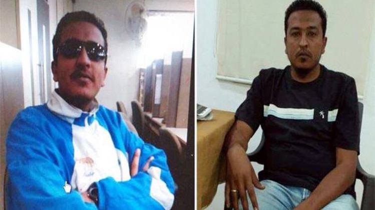 पुलिस गिरफ्त में खड़े संदिग्ध IS आतंकी