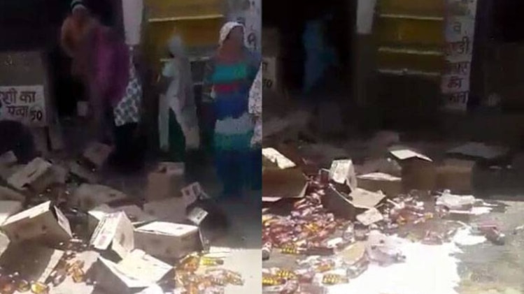 महिलाओं ने शराब की पेटियों में आग लगा दी