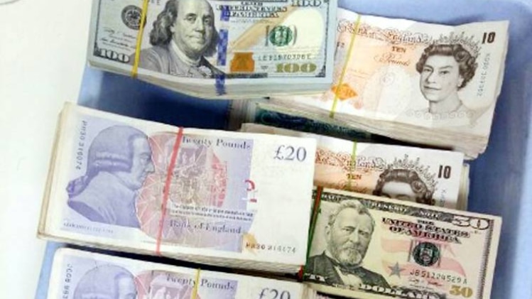 विदेशी करेंसी के साथ युवक गिरफ्तार