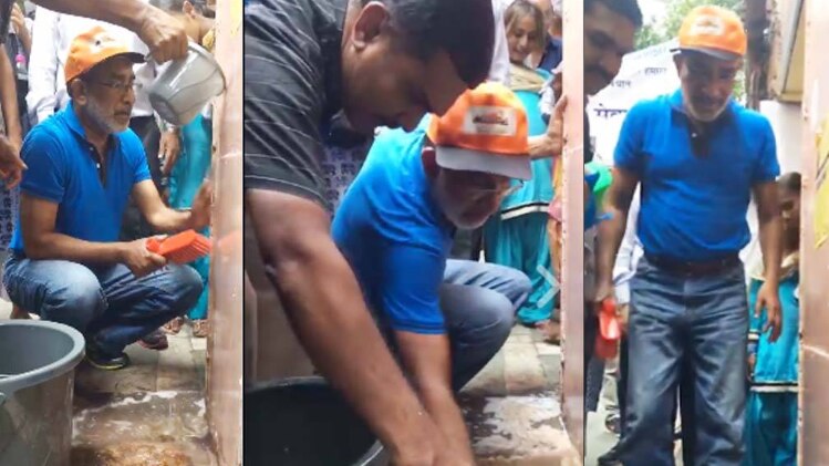 सफाई करते केन्द्रीय पर्यटन मंत्री अल्फांस कन्ननधनम