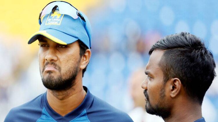 श्रीलंकाई कप्तान चांडीमल (बाएं)