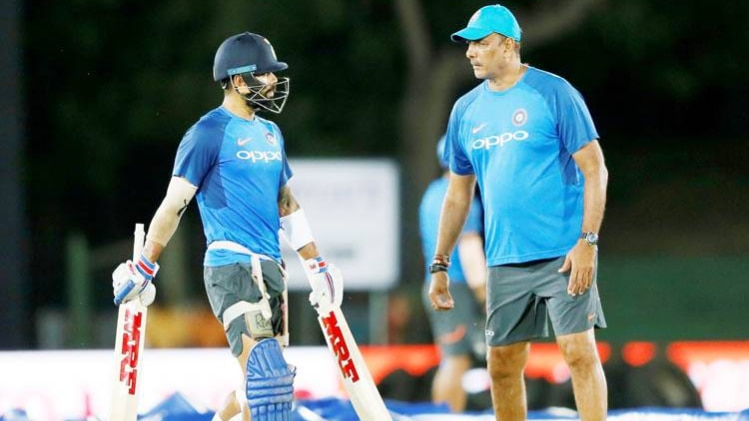 कोहली और कोच शास्त्री 