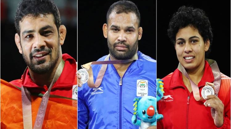 मेडल के साथ खिलाड़ी 