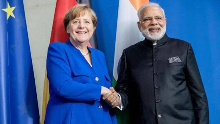 एंजेला मर्केल के साथ पीएम मोदी (फाइल)