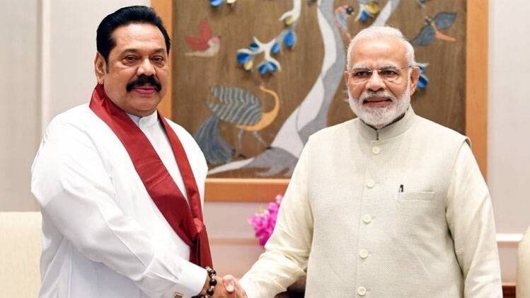 महिंदा राजपक्षे और पीएम मोदी (ट्विटर फोटो- @PresRajapaksa)