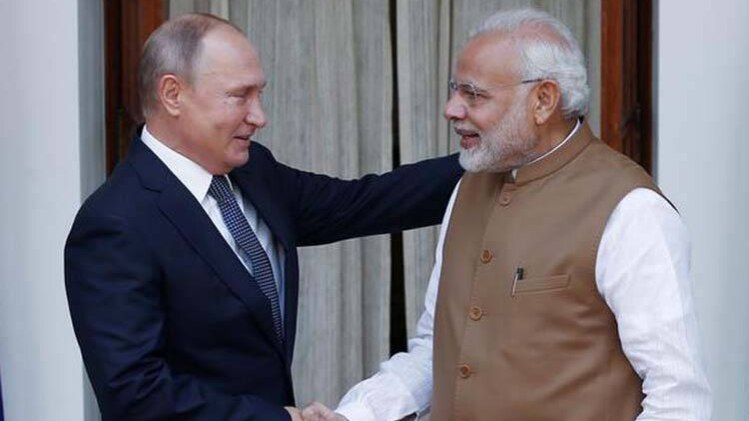 पीएम मोदी और राष्ट्रपति पुतिन (फोटो-रॉयटर्स)