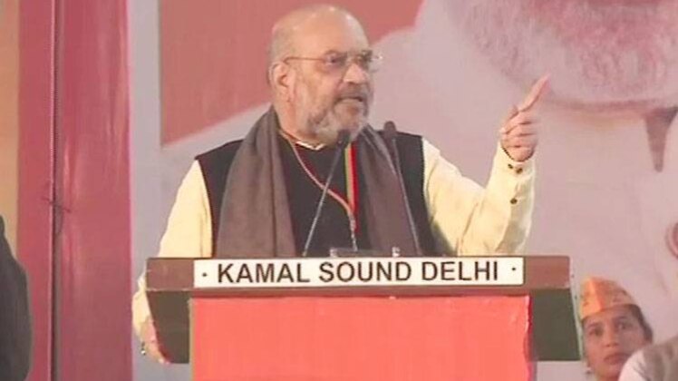 बीजेपी बूथ सम्मेलन में अमित शाह (फोटो-ANI)