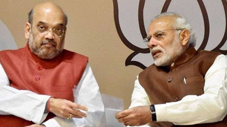 पीएम नरेंद्र मोदी के साथ अमित शाह (फाइल फोटो-PTI)