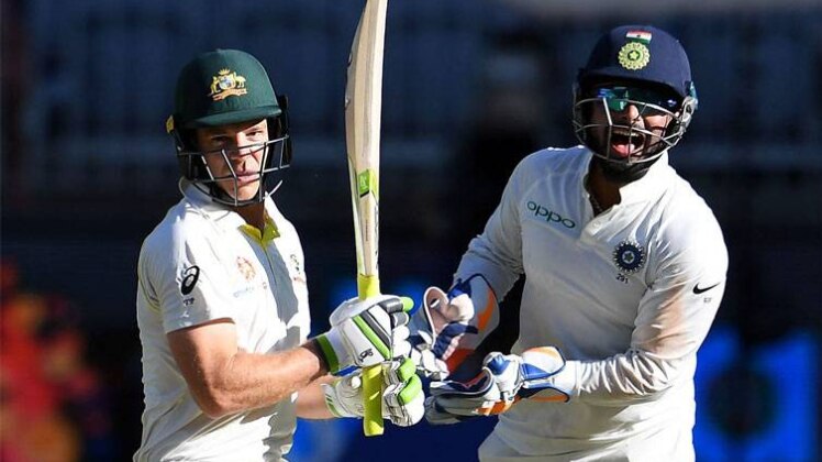 Rishabh Pant and Australia skipper Tim Paine