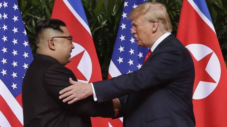 डोनाल्ड ट्रंप और किम जोंग उन (फोटो-AP)