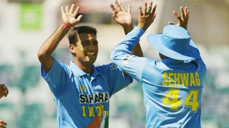 वीरेंद्र सहवाग के साथ अमित भंडारी