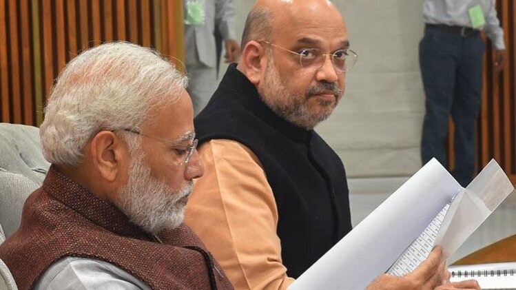 नरेंद्र मोदी और अमित शाह (फोटो-PTI)
