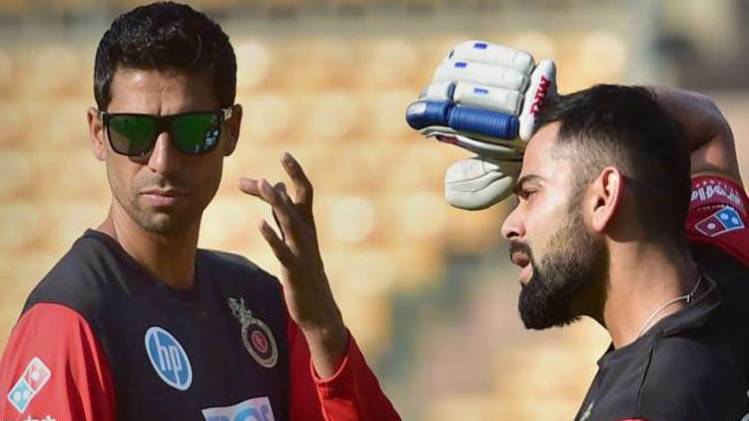 Ashish Nehra and Virat Kohli