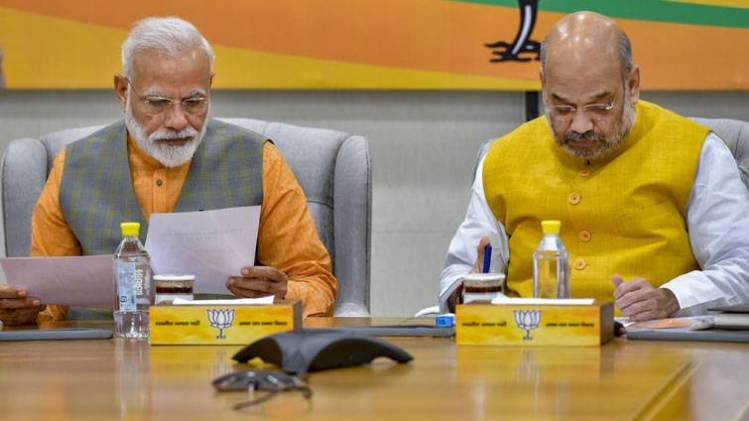 प्रधानमंत्री नरेंद्र मोदी और बीजेपी अध्यक्ष अमित शाह (PTI)