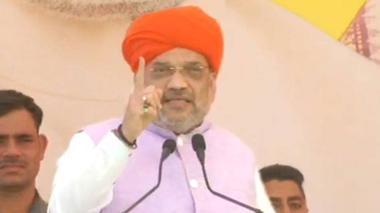 उधमपुर में रैली को संबोधित करते हुए बीजेपी अध्यक्ष अमित शाह