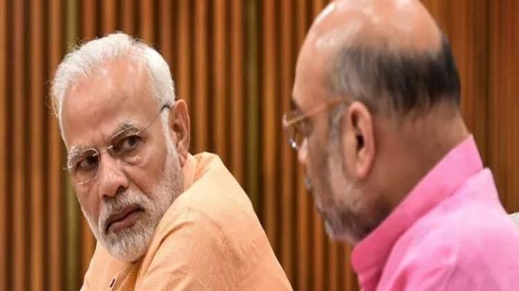 प्रधानमंत्री नरेंद्र मोदी और अमित शाह (पीटीआई फाइल फोटो )