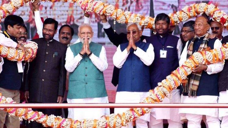 नरेंद्र मोदी और नीतीश कुमार (फोटो-Twitter)