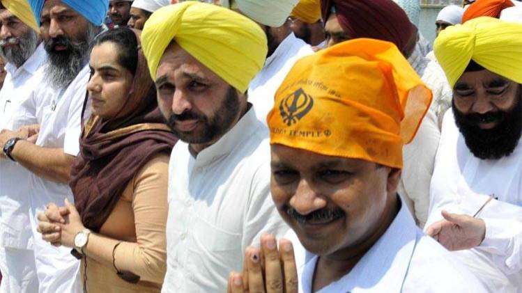 भगवंत मान और अरविंद केजरीवाल (फोटो-Getty image)