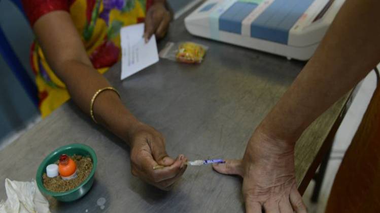 मतदान केंद्रों पर कड़ी सुरक्षा (Photo: Getty)