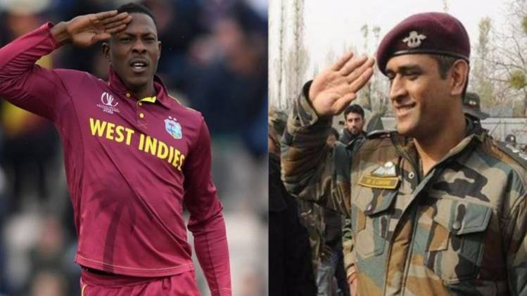 Sheldon Cottrell and MS Dhoni