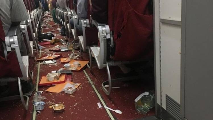 घटना के बाद विमान में बिखरा सामान (ANI)