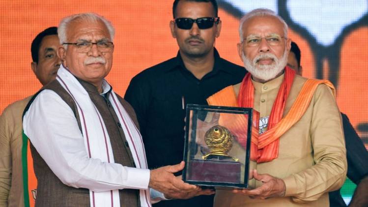 Haryana Exit Polls पीएम मोदी के साथ मुख्यमंत्री मनोहर लाल खट्टर (PTI) 