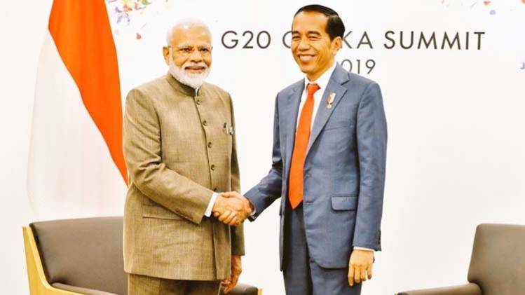 प्रधानमंत्री नरेंद्र मोदी और इंडोनेशिया के राष्ट्रपति जोको विडोडो (Photo- Aajtak)
