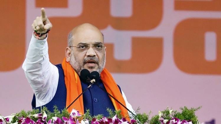 बीजेपी कार्यकर्ताओं को संबोधित करते अमित शाह (File photo)