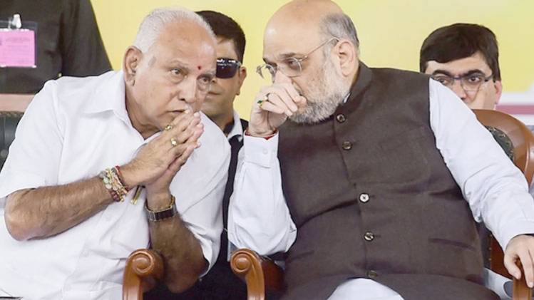 कर्नाटक के सीएम बी. एस. येदियुरप्पा और बीजेपी अध्यक्ष अमित शाह (Courtesy- PTI)