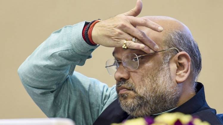 कांग्रेस ने केंद्रीय गृह मंत्री अमित शाह पर खड़े किए सवाल (फोटो: PTI)