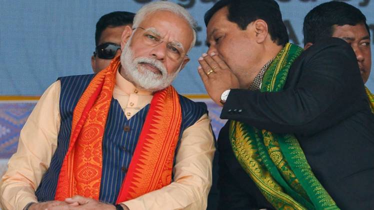 प्रधानमंत्री नरेंद्र मोदी और असम के सीएम सर्बानंद सोनोवाल (फोटो-पीटीआई)